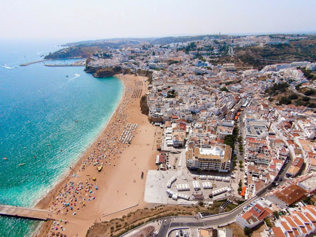 Iconic Apartment with 2 bedrooms & full kitchen Vacation Rental in Olhos de Agua - RedAwning